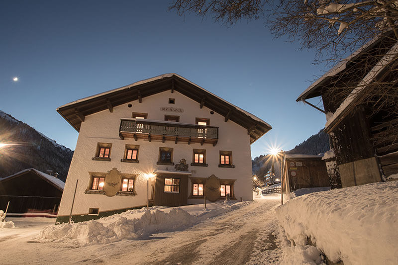 Pension Der Steinbock in winter exterior view