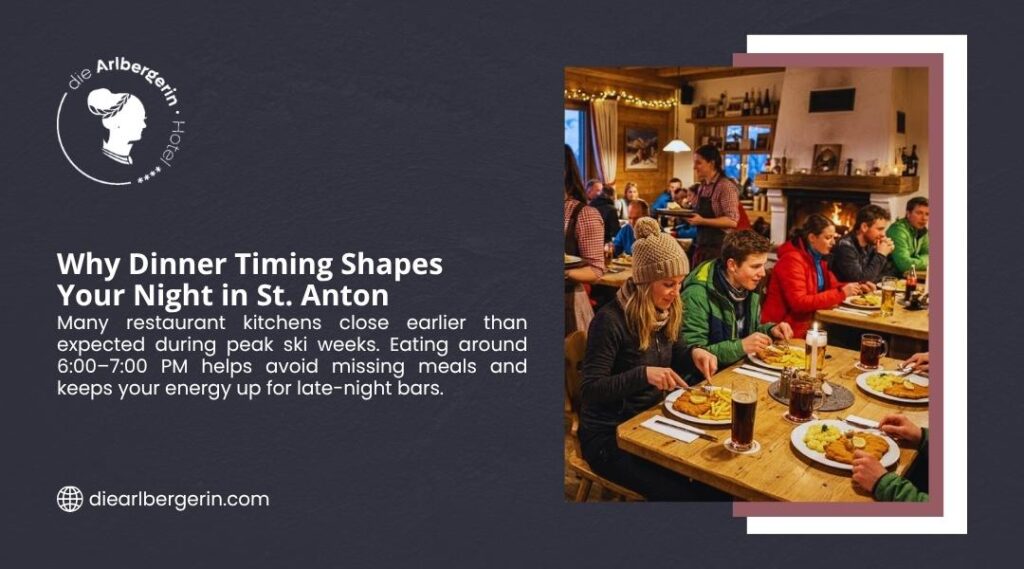 Why Dinner Timing Shapes Your Night in St. Anton. Group of people enjoying dinner at a cozy, crowded alpine restaurant with wooden tables, fireplace, and traditional Austrian dishes. die Arlbergerin Hotel.