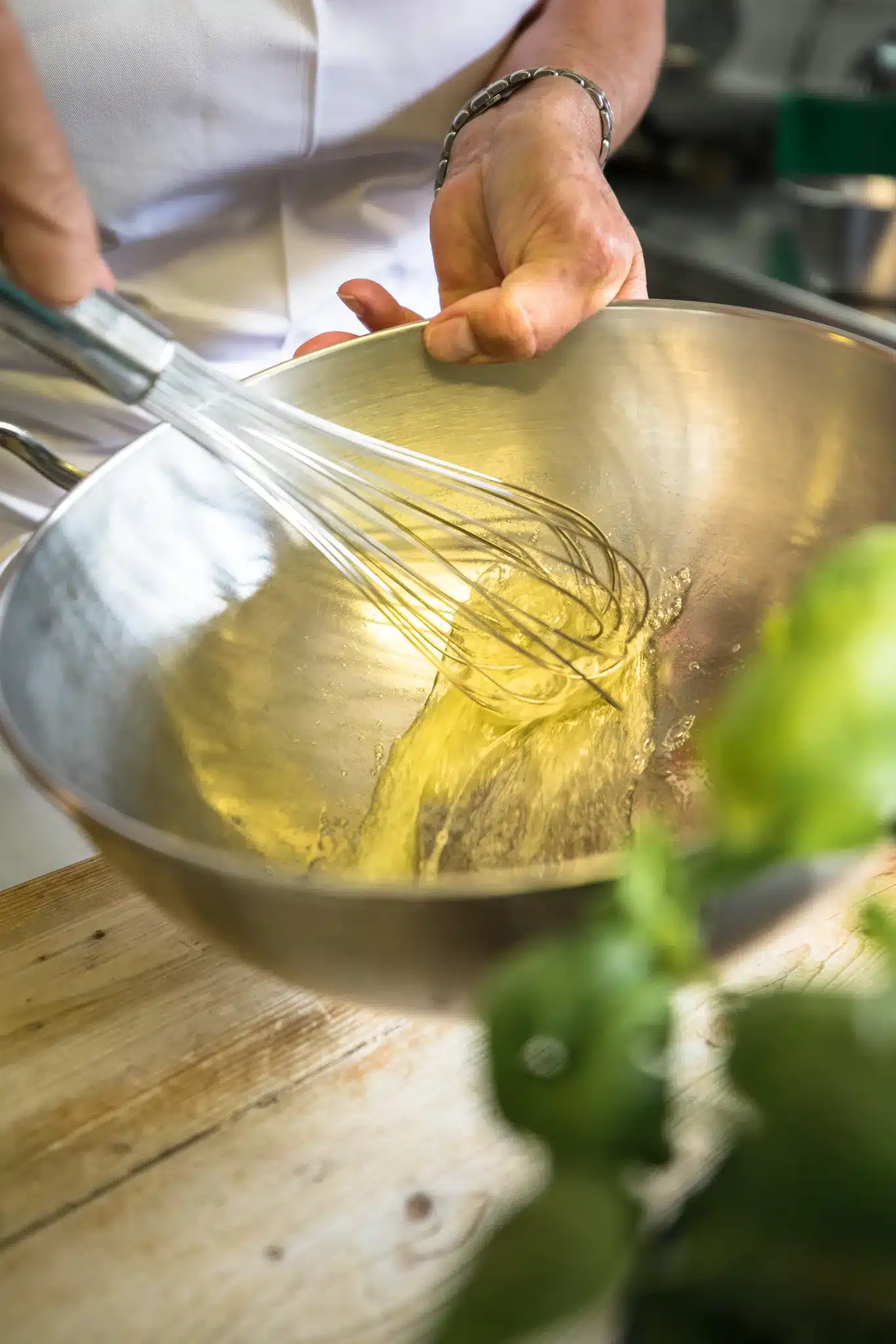 Startseite 88 Whisking egg batter in a steel bowl